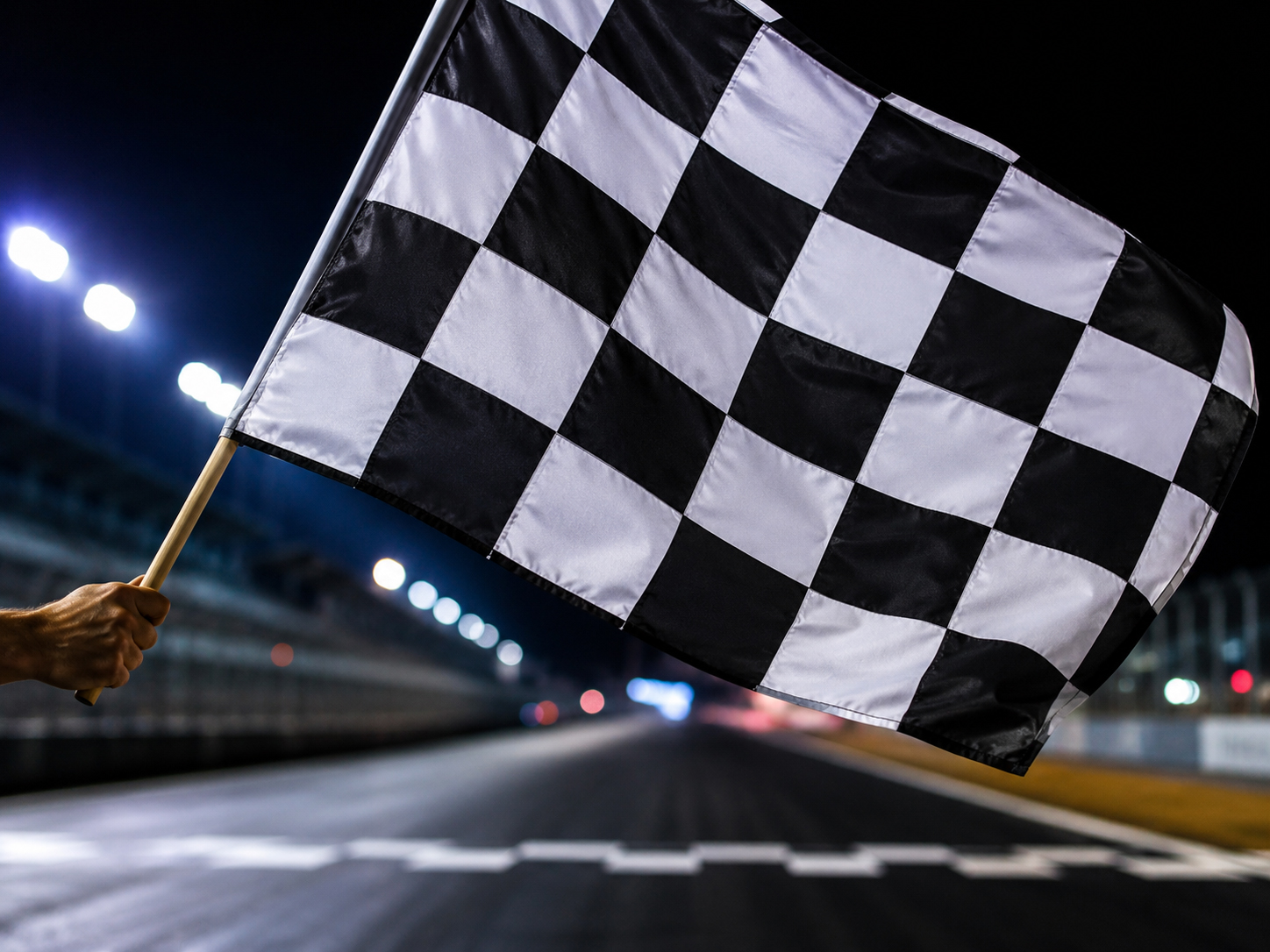 Checkered racing flag waving at the finish line